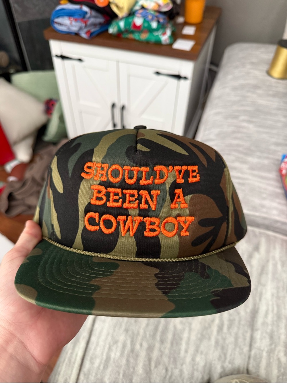 Camouflage Snapback Hat with Orange Embroidered Slogan